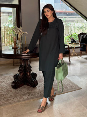 Green linen kurta shalwar two-piece casual summer outfit for women – front view