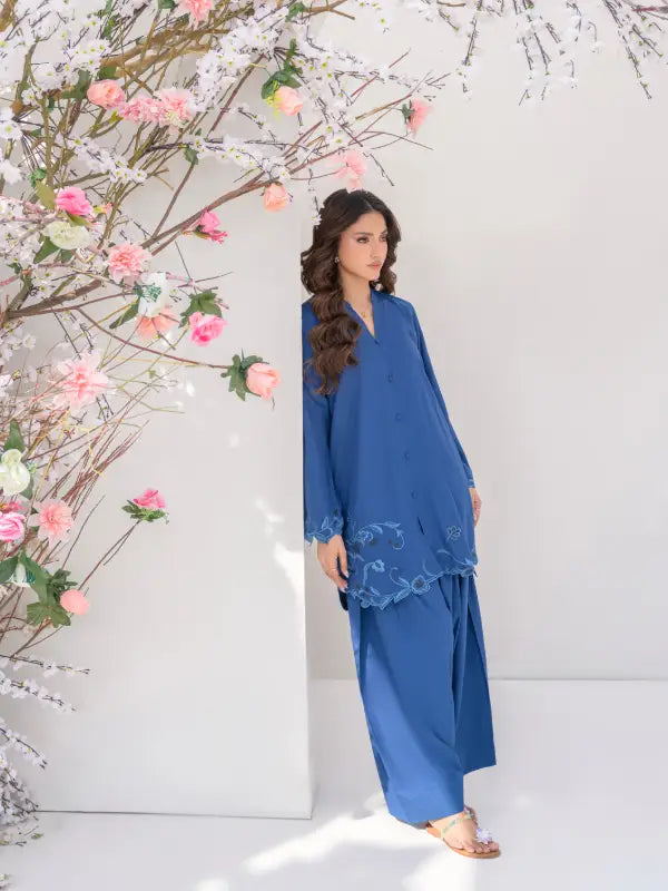 Royal blue boski linen outfit featuring embroidered hem and relaxed farshi shalwar